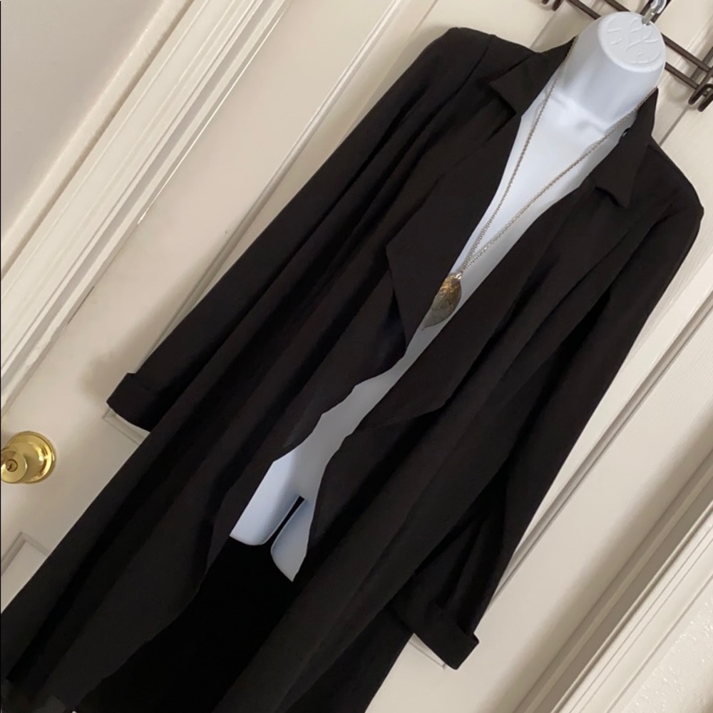 Knee-length long sleeved contemporary cardigan